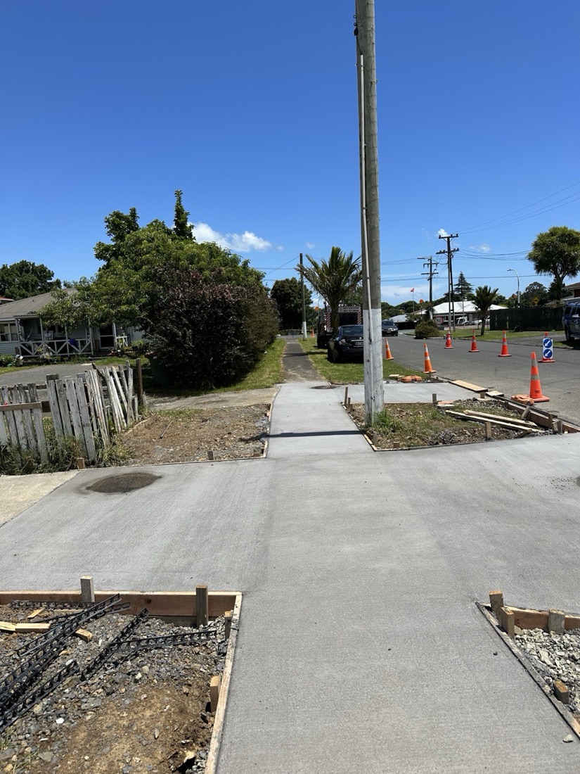 Finished concrete driveway and footpath access