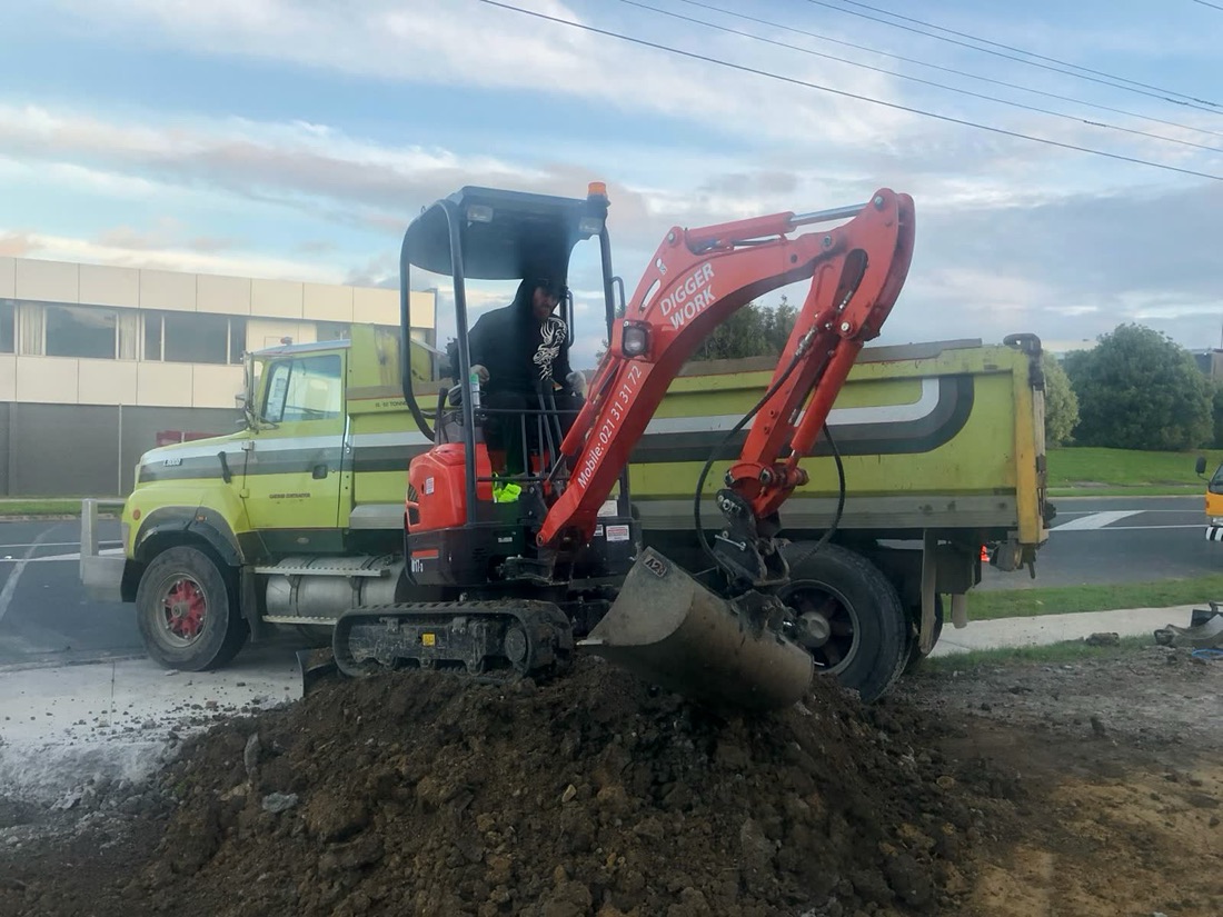 Excavator and truck support for earthworks and site preparation