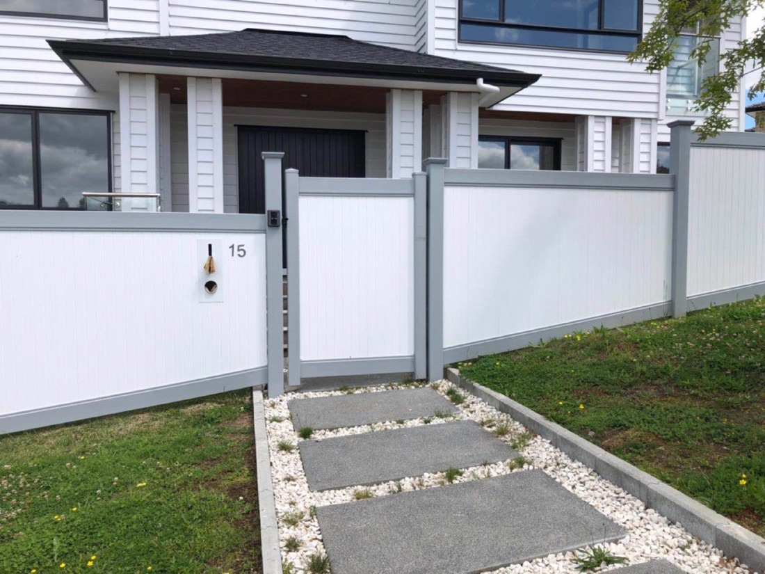 Front fence and stepping path leading to a residential entrance